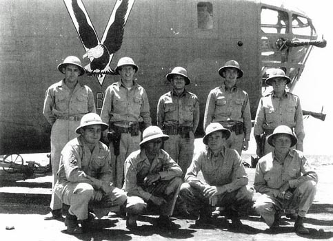 The Dore Crew of “Old Baldy” in a photo taken some time before the Tidal Wave mission. T/Sgt Lower is kneeling at the far left (B24bestweb.com) The Dore Crew of “Old Baldy” in a photo taken some time before the Tidal Wave mission. T/Sgt Lower is kneeling at the far left (B24bestweb.com)